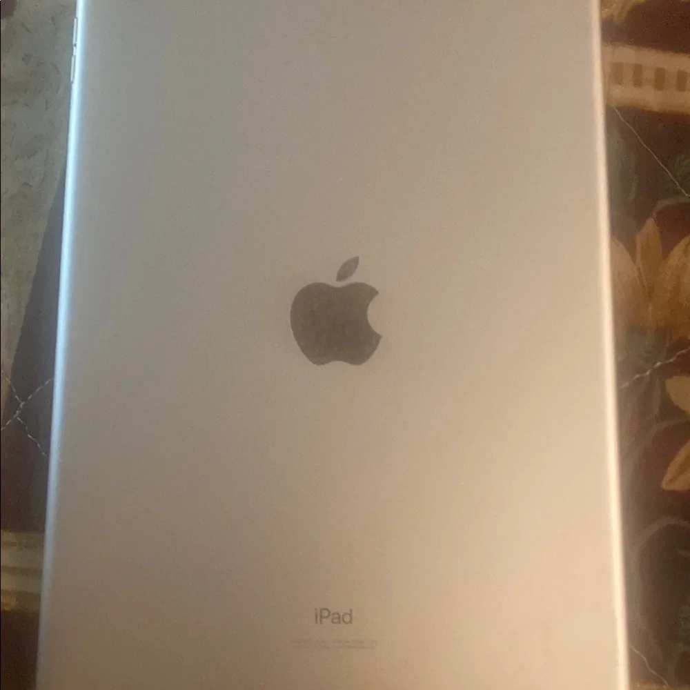 Apple White Tablet with Sleek Design and Rounded Corners